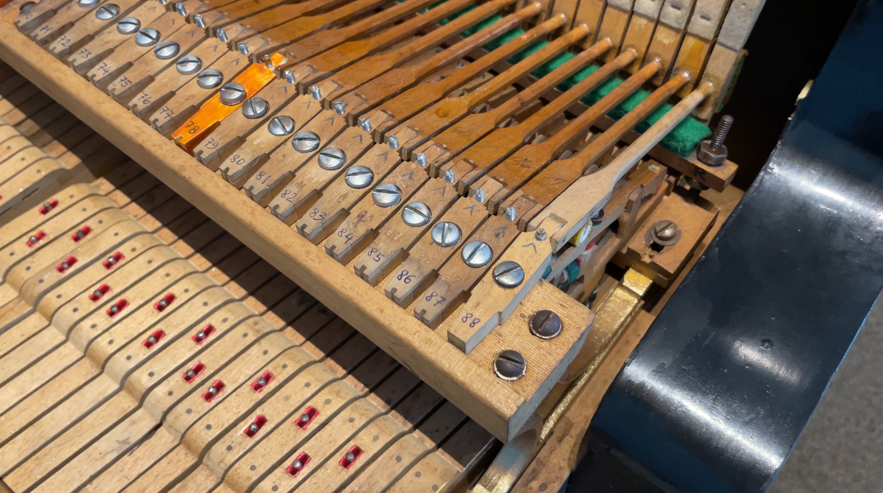 Zhivko Girginov, who holds a Bachelor’s Degree in Musical Pedagogy and Piano Performance at the Academy of Music, Dance and Visual Arts "Prof. Asen Diamandiev" – Plovdiv, Bulgaria, carrying out repair and reconditioning works on the Chappell at the National Library Building, 2023. Photos by Woo Pei Qi.